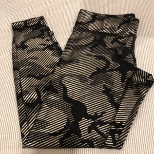 Terez black and gold foil camo leggings